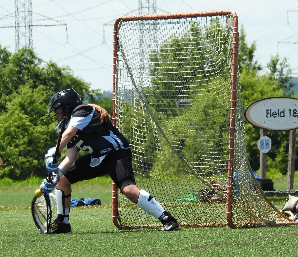 Virginia United goalie saving a low shot